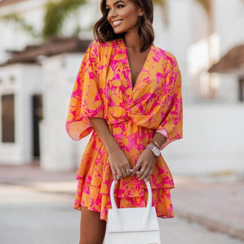 Women’s Floral Wrap Mini Dress with Ruffle Hem and Flowing Sleeves