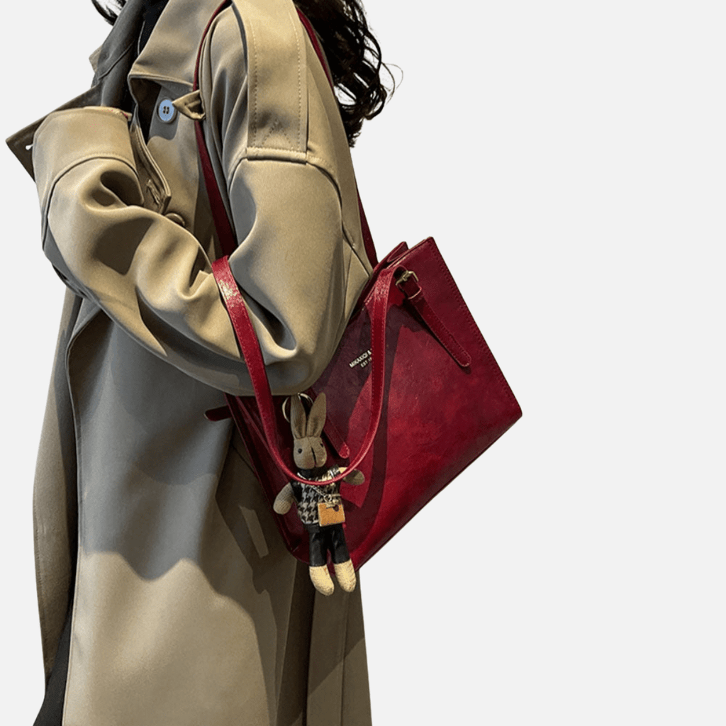 Women’s Structured Shoulder Bag with Dual Straps and Hanging Charm Detail