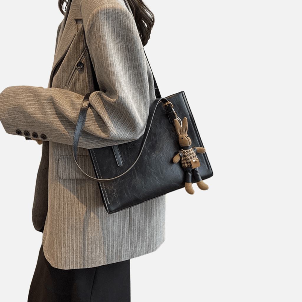 Women’s Structured Shoulder Bag with Dual Straps and Hanging Charm Detail
